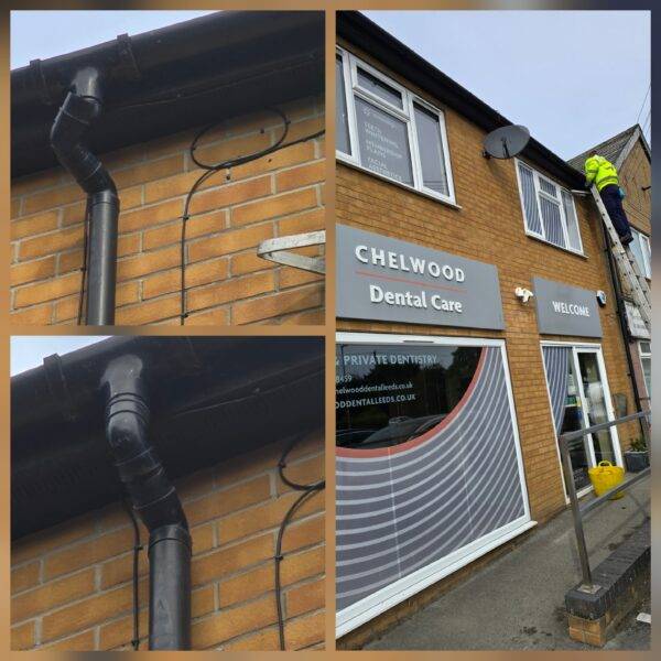 Trusted Cleanerz Ltd operators manually cleaning gutters in Wakefield using ladders with standoffs