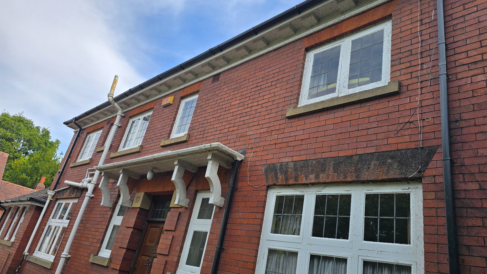 Completed ivy removal project in Ackworth showing the cleared exterior of the property