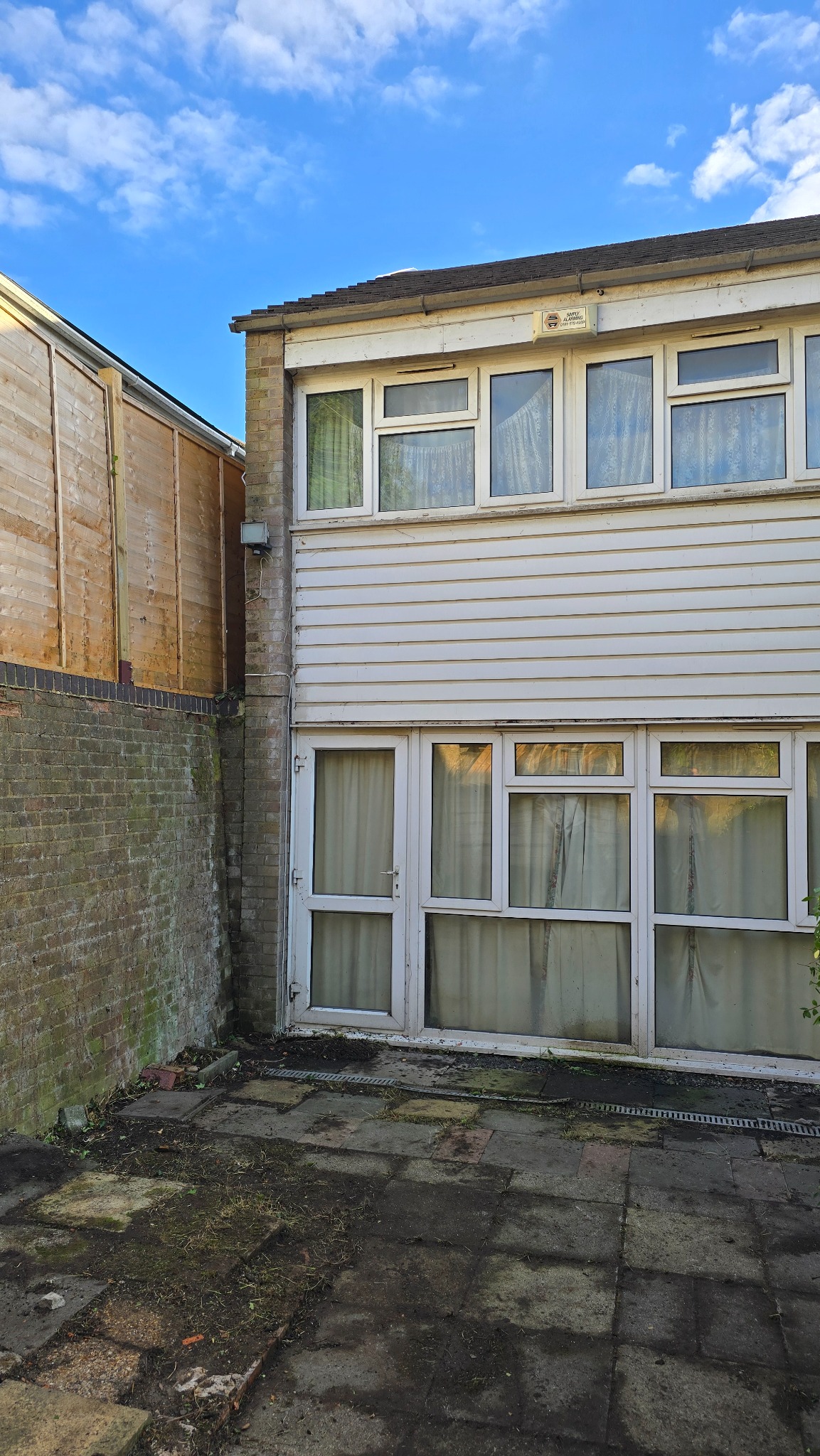 Rear elevation fully cleared after heavy ivy removal in Croydon, London