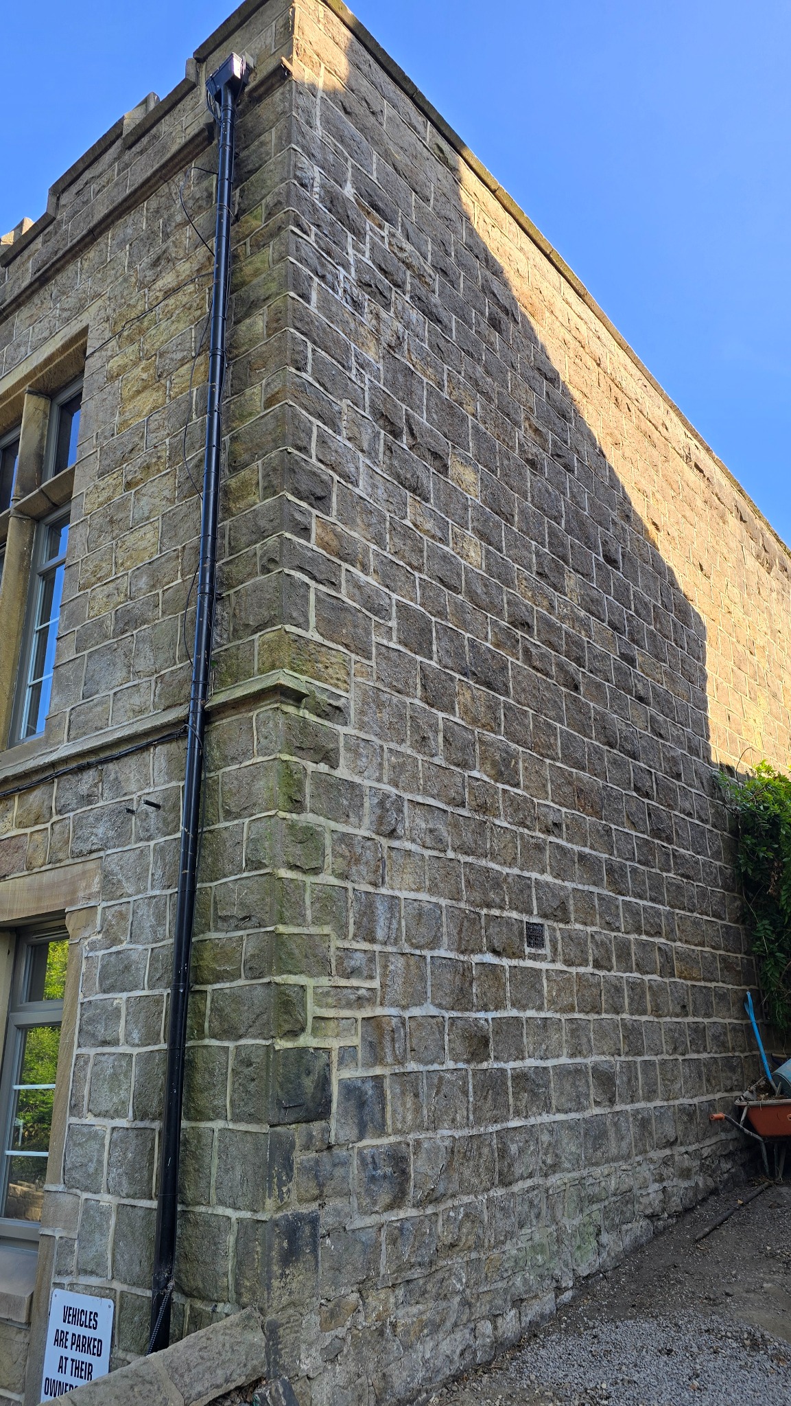 Stone wall of a care home in Ilkley after professional ivy removal